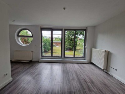 Lasst euch verzaubern in der schicken 1-Zimmer-EG-Wohnung mit eigenem Garten!