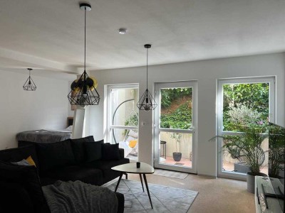 Gepflegte 1,5-Zimmer-Terrassenwohnung mit Balkon und Einbauküche in Hadamar.