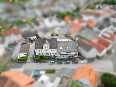 Top-Invest in Erlensee: Vielseitig nutzbare Liegenschaft mit Wohnen und Gewerbe