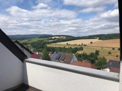 Gepflegte 2-Raum-DG-Wohnung mit Balkon und Einbauküche in Rüdesheim am Rhein