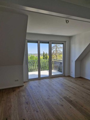 Neubau-Galerie-Wohnung mit Blick ins Grüne in Grass