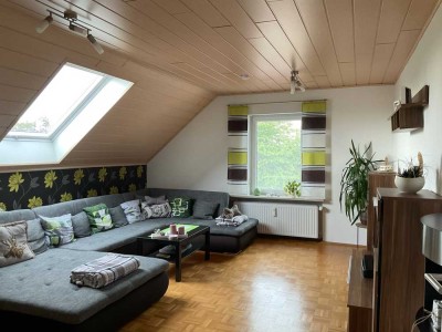 Gepflegte 3,5 Zimmer Dachgeschoss Wohnung mit Gartenanteil