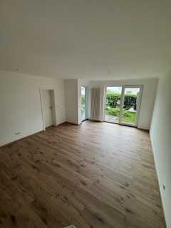 Stilvolle 2-Zimmer-Erdgeschosswohnung mit Terrasse und kleinem Garten in Pfaffenheck