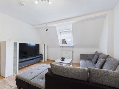 Charmante Dachgeschosswohnung mit Gemeinschaftsgarten – Ideal für Singles & Paare!