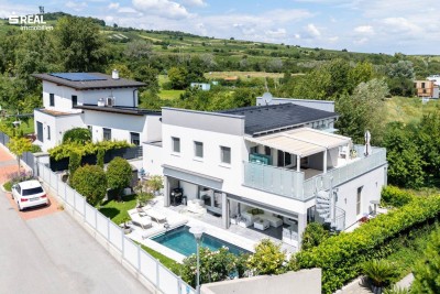 Luxusimmobilie am Fuße der Weinberge in Guntramsdorf - Pool, Sauna, Doppelgarage und wunderschön angelegtem Garten - alles hochwertig!