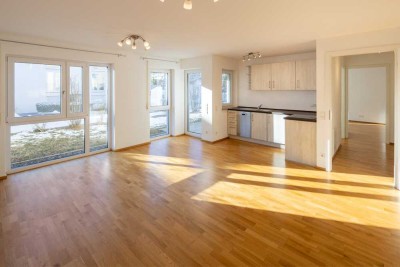 Moderne Erdgeschosswohnung mit Terrasse und Gartenanteil