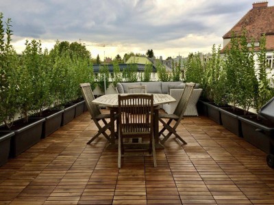 Lichtdurchflutete Dachgeschosswohnung mit 32m2 Terrasse und Fernblick ins Grüne