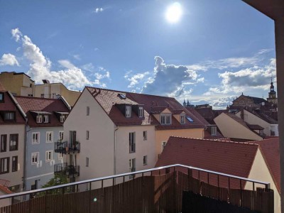 Großzügig geschnittene 4 Zimmer-Wohnung mit Balkon im Quartier an den Stadtmauern