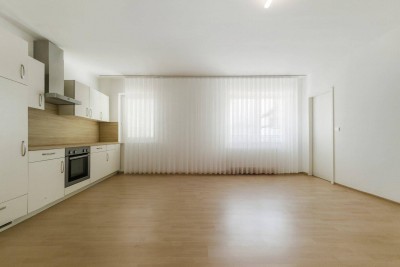 Anlegerwohnung zu verkaufen: befristet vermietete 3-Zimmer-Wohnung + Tiefgaragenplatz mit 4,15% IST Rendite und 6% Soll Potential