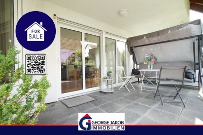 GEORGE JAKOB IMMOBILIEN: Charmantes Einfamilienhaus mit grüner Oase!