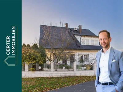 Exklusives Zweifamilienhaus mit Einliegerwohnung, Garten, Pool und Platz für Ihre Visionen!