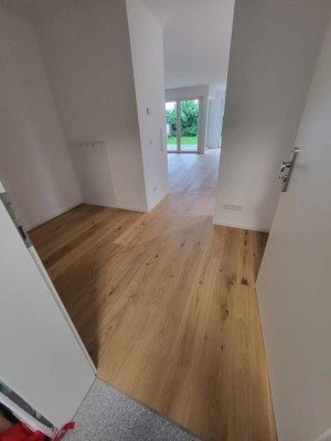 Erstbezug nach Neubau 4 - Zimmer Maisonettewohnung mit schönem Garten