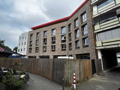 Neubau mit Dachterrasse und EBK: Geschmackvolle 2-Zi.-Whg. in MG in zentraler Lage