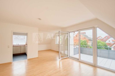 Moderne Dachgeschosswohnung mit Sonnenbalkon in Südost-Orientierung inkl. Einbauküche und Garage