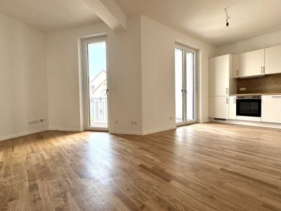Moderne Erstvermietung: 4-Zimmer mit Gäste-WC, Balkon und moderner Einbauküche