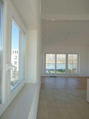 Rheinblick sonnenhelle 3-Zimmer-Wohnung mit großem Westbalkon in Grau-Rheindorf