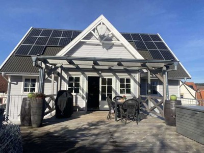 Diese wunderschöne Liegenschaft mit zwei Wohneinheiten und herrlichem Grundstück erfüllt Wohnträume