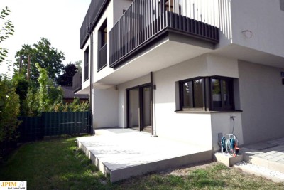 Erstbezug, ziegelmassive Süd-Ost-Seitige Haushälfte mit Küche und KFZ-Stellplatz