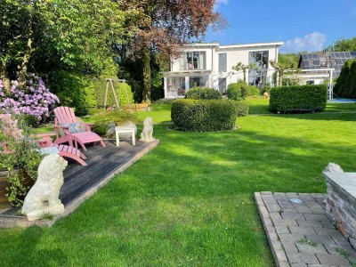 Zeitlose Villa mit Galerie, großem Garten und viel Potential in ruhiger Lage