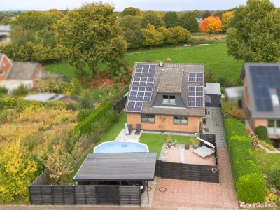 Großzügiges Einfamilienhaus in Feldrandlage mit Wintergarten, Sauna, Klimakomfort & Ausbaupotenzial