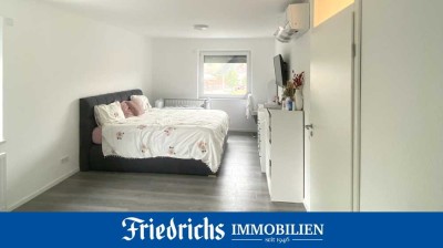 Modernisierte 3-Zimmer-Wohnung in einem Wohn- und Geschäftshaus im 2. Obergeschoss in Rostrup-BZ