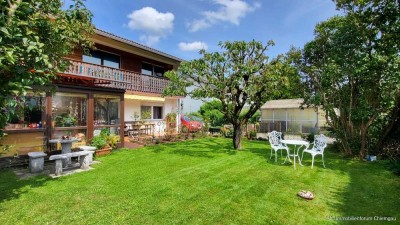 Für Gartenliebhaber! 
Ruhig & sonnig gelegene 
3-4 Zi.-Erdgeschosswohnung mit Wintergarten & Garag