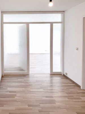 Schöne 3-Zimmer-Wohnung mit neuer Einbauküche, Balkon und TG-Stellplatz in ruhigem Wohngebiet