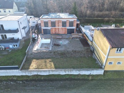 Neubau-Doppelhaushälfte in Enns: Traumhaus mit Garten, Terrasse und Garage