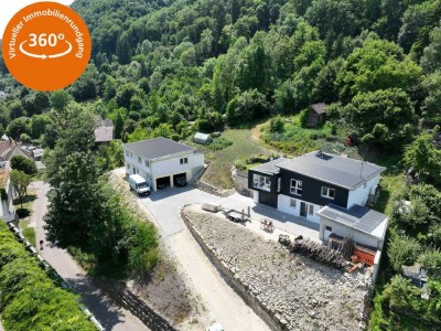"Zwei Häuser, ein Grundstück - Großzügiges Anwesen mit Neubau, Rohbau und Panoramablick"