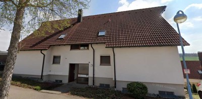 Vermietete 1-Raum-EG-Wohnung mit Terrasse, Einbauküche und Garage