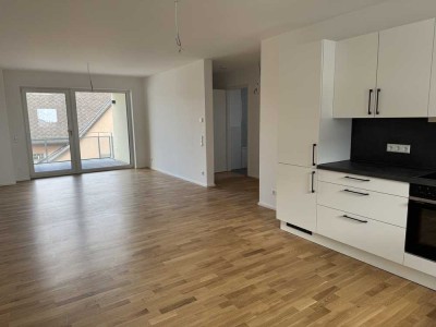 Erstbezug: Attraktive 3 Zimmer Wohnung im EG mit TG-Stellplatz in Lehr zu vermieten!