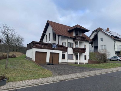 Attraktives Einfamilienhaus mit Einliegerwohnung oder Bürooption