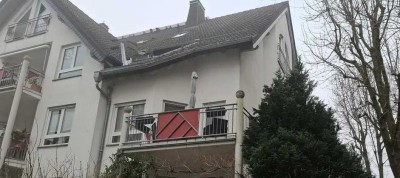 Attraktive 3-Zimmer-Wohnung mit Balkon in zentraler, aber ruhiger, durchgrünter Lage von Bruchköbel