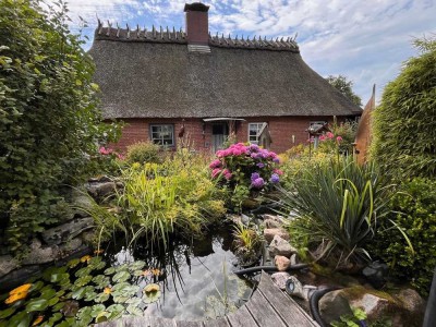 Traumhafte Reetkate mit wunderschönem Garten
