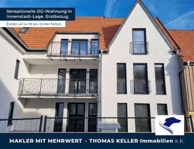 Zentral wohnen in modernem Neubau. Erstbezug. Mit Loggia.