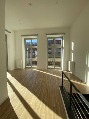 Altbautradition neu gedacht – stilvolle 2-Zimmer-Wohnung auf zwei Etagen mit Terrasse!