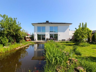Elegante Stadthausvilla mit modernster Energietechnik und Gartenparadies in Kalbach