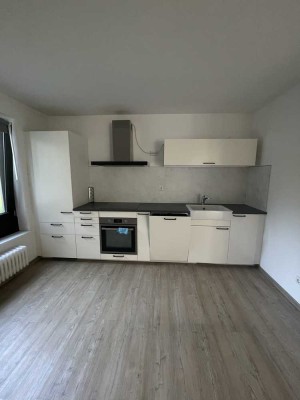 2-Zimmer-Wohnung mit moderner Einbauküche und Balkon im Zentrum von Meerbusch-Büderich