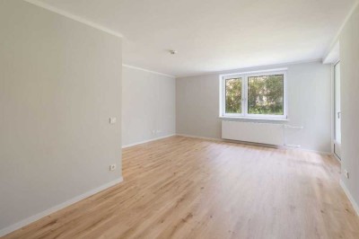 Erstbezug nach hochwertiger Sanierung im Erdgeschoss 1-Zimmer mit Einbauküche, Duschbad und Terrasse