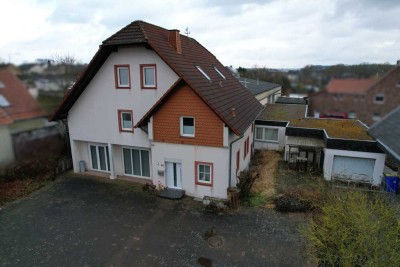 Einfamilienhaus mit Gewerbehalle und Garten auf 2.600 m² Grundstück in Borgentreich-Borgholz