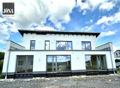 Architektenhaus mit Fernblick – 
Erstbezug in exklusiver Wohnlage