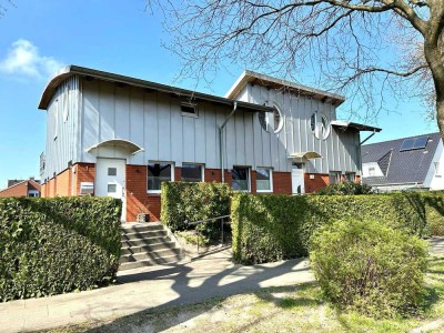 Hochwertige EG - Wohnung über 2 Ebenen mit 2 Garagen zu verkaufen