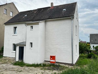 Teilsaniertes Mehrfamilienhaus für 2 Generationen