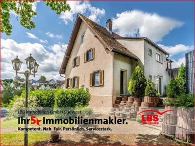 Familienfreundliches Einfamilienhaus inkl. voll erschlossenem Baugrundstück im Garten
