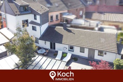 Charmantes Einfamilienhaus mit großer Terrasse, Garten & Doppelgarage in zentraler Lage von Alsdorf!