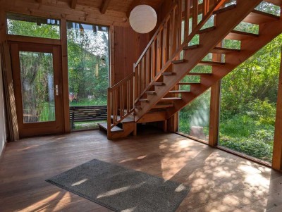 3-Zimmer Wohnung mit Wintergarten und großem Garten