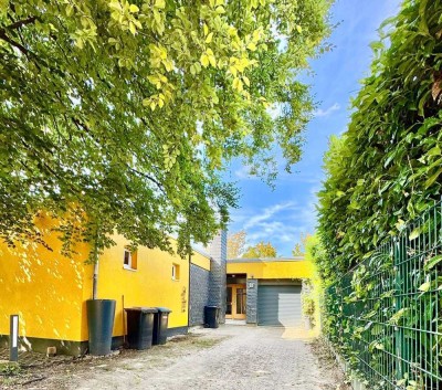 Großzügiger Bungalow + Einliegerwohnung, Garten & Garage – ruhig gelegen - sofort bezugsfrei