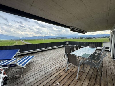 Traumhafte Eigentumswohnung mit riesiger Südwestterrasse und Carportstellplatz