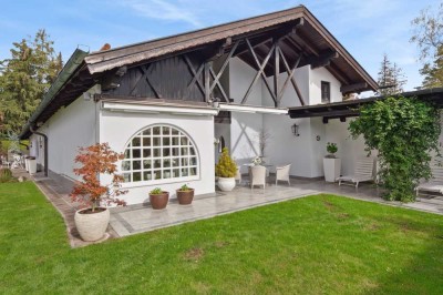 "Haus im Haus" - Stilvoller Wohntraum mit privatem Garten