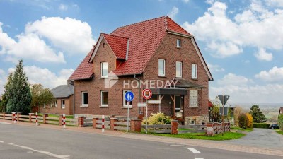 Charmantes Zweifamilienhaus mit Garten, Garagen in Obernkirchen